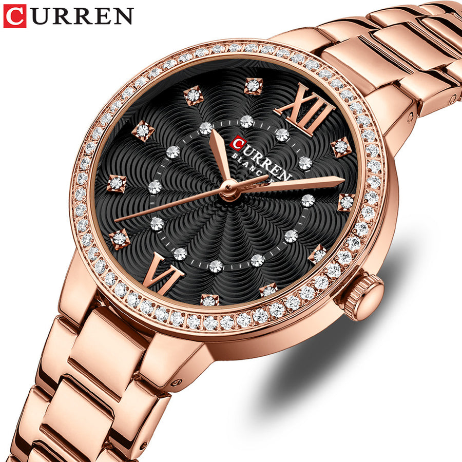 Ladies rose gold watch with round dial and stainless steel bracelet