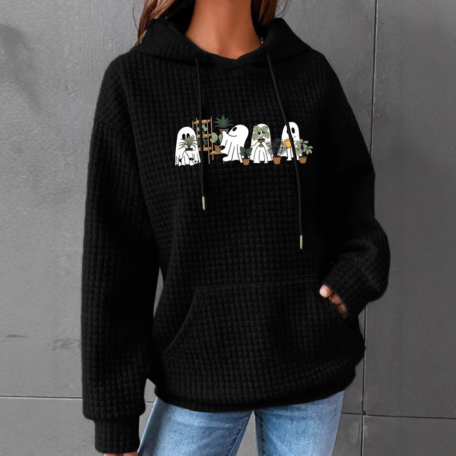A gray waffle-knit hoodie with a kangaroo pocket printed with a row of little ghosts tending potted houseplants.