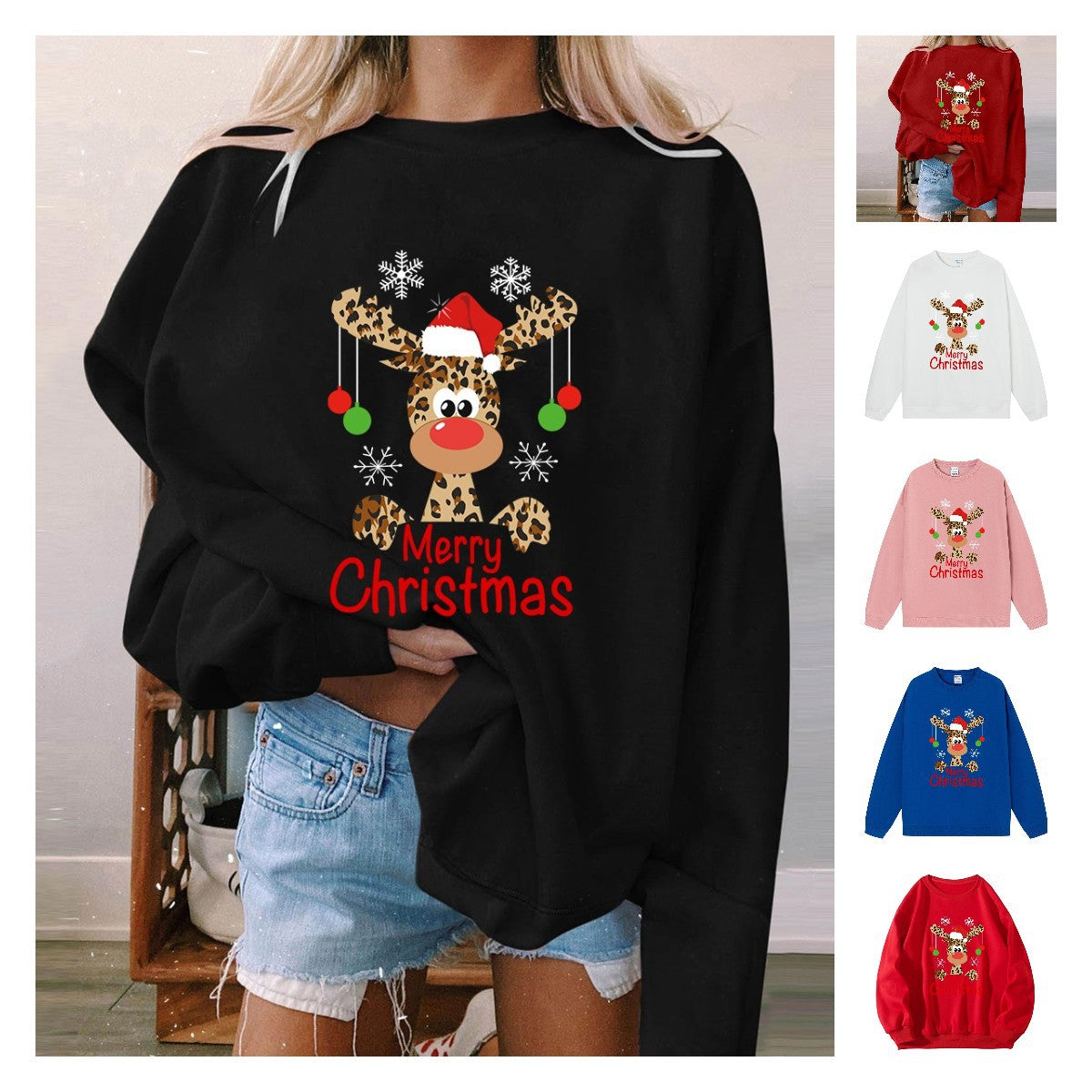 A black crewneck sweatshirt printed with a leopard-print reindeer in a Santa hat hung with ornaments above Merry Christmas in red, shown with smaller images of other colors.
