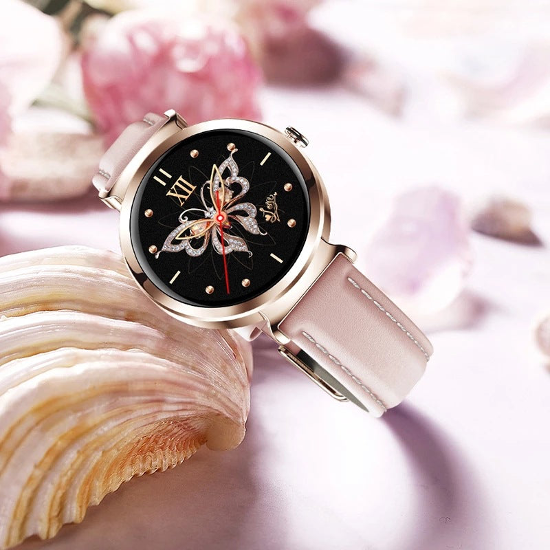 Gold smart watch with red leather strap, black dial featuring a rhinestone butterfly design