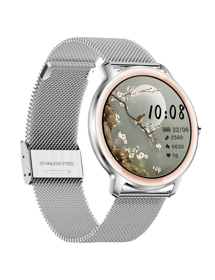 Rose gold smartwatch with a starry night dial, crystal hour markers, and a mesh strap