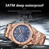 Rose gold-tone watch with a blue textured dial, octagonal bezel, shown with water droplets on the case