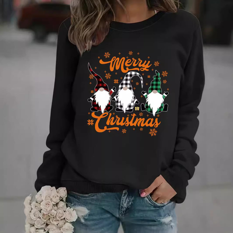 A black crewneck sweatshirt printed with three plaid-hatted gnomes and snowflakes between Merry and Christmas in orange script.