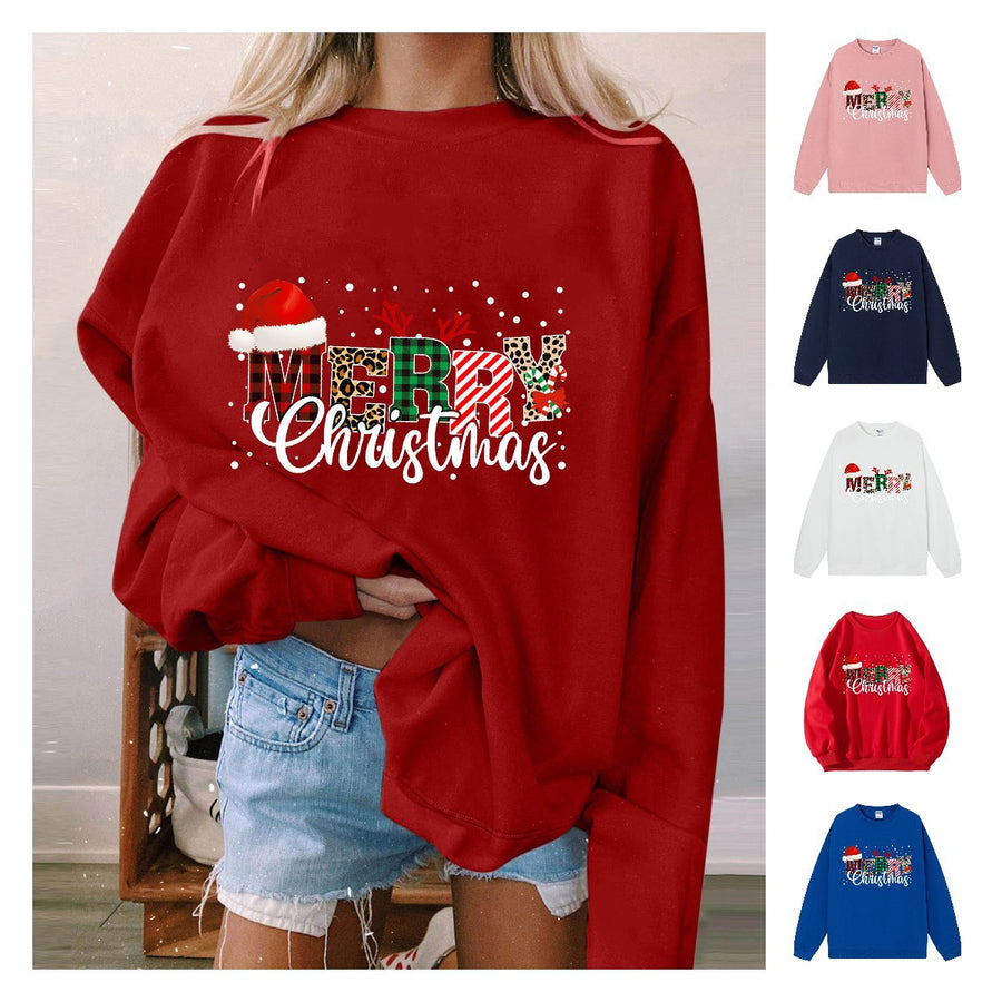 A red crewneck sweatshirt printed with Merry Christmas in patterned lettering topped with a Santa hat, shown with smaller images of other colors.