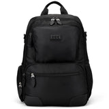 A black ELLE Voyage backpack in twill polyester and vegan leather, with a front zip pocket, adjustable straps, and a vegan-leather trolley sleeve for attaching to luggage.