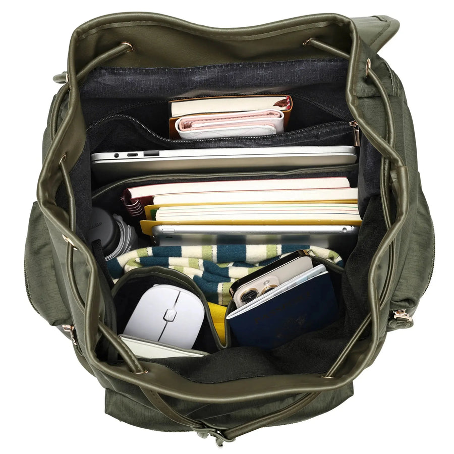 An olive green ELLE Wayfarer backpack in twill polyester and vegan leather, with a front zip pocket, adjustable padded straps, and a vegan-leather trolley sleeve on the back.