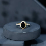 1 Carat Oval Black Onyx and Diamond Halo Engagement Ring